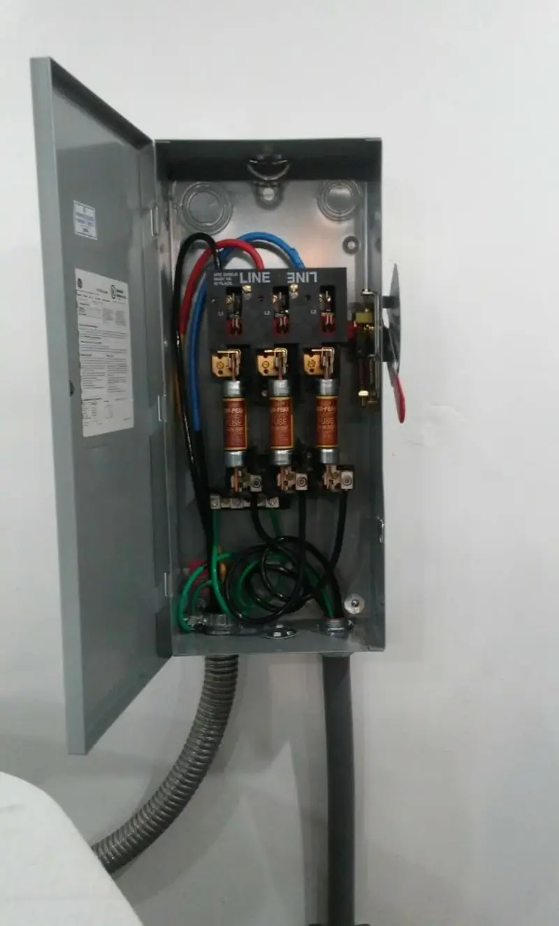 Three-phase disconnect switch installed for Smoke Detector Installation in Amity